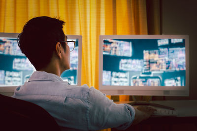 Businessman working on stock chart and market report on computer 