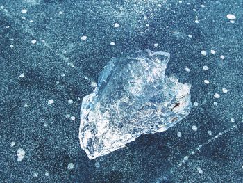 High angle view of ice on water