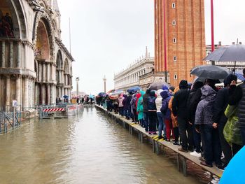 Group of people in front of building