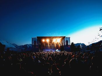 Crowd at music concert at night