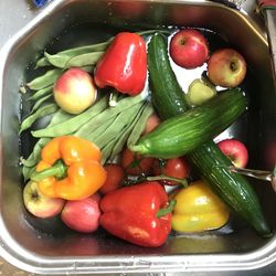 Close-up of bell peppers in water