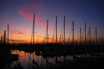 Silhouette of marina at sunset