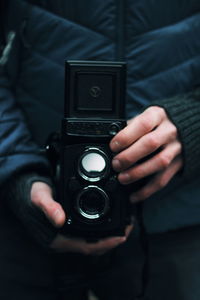 Midsection of man photographing