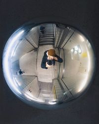 High angle view of people in mirror