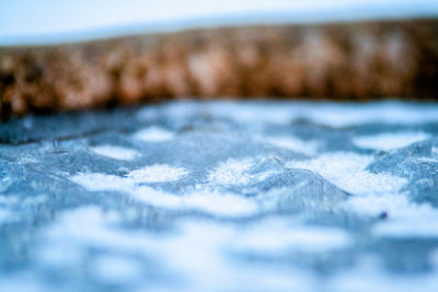 Close-up of water against blue sky