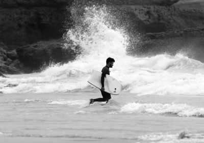 Man surfing in sea