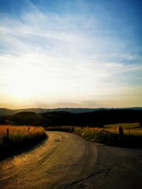 Scenic view of landscape against sky during sunset