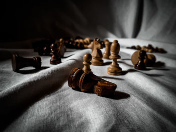 Close-up of chess pieces on table