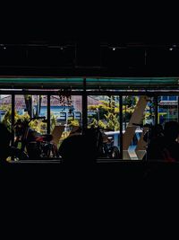 Group of people in bus at night