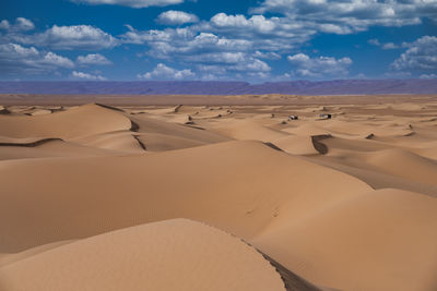 Scenic view of desert against sky