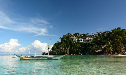 Scenic view of bay against sky