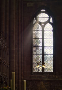 Sunlight streaming through window in old building