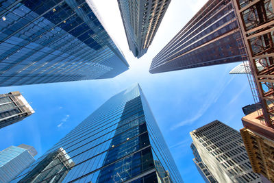 Low angle view of modern buildings against sky