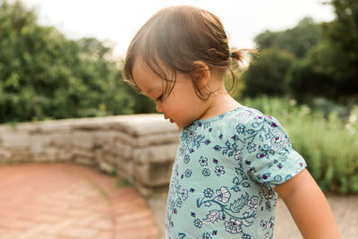 Girl standing outdoors