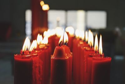 Close-up of burning candles