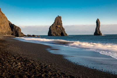 Panoramic view of sea against clear sky