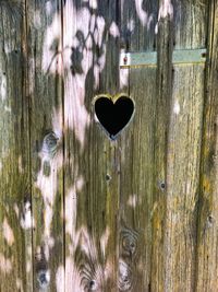 Close-up of heart shape on water