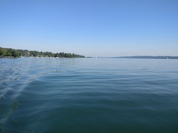 Scenic view of sea against clear blue sky