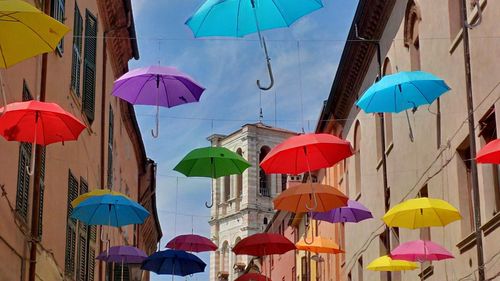 Multi colored umbrellas for sale in market