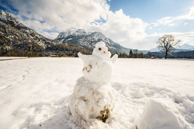 View of snowcapped mountain against sky during winter