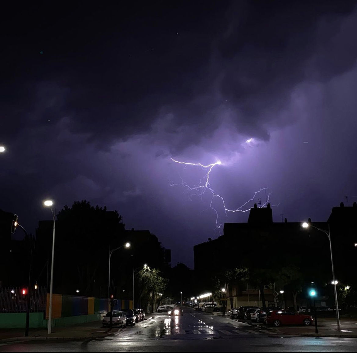 SCENIC VIEW OF LIGHTNING OVER CITY