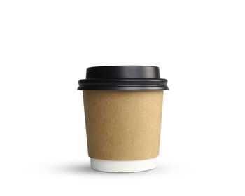 Close-up of coffee cup against white background