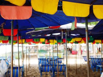 Multi colored chairs at beach