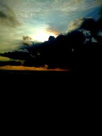 Silhouette landscape against sky during sunset