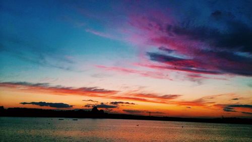 Scenic view of sea at sunset