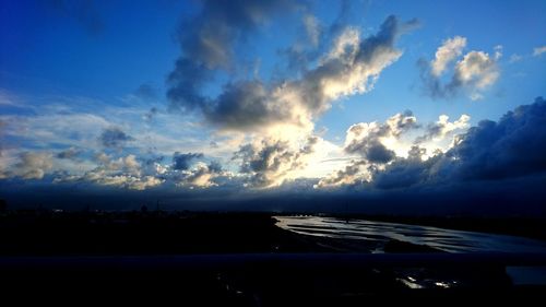 Scenic view of sea against blue sky