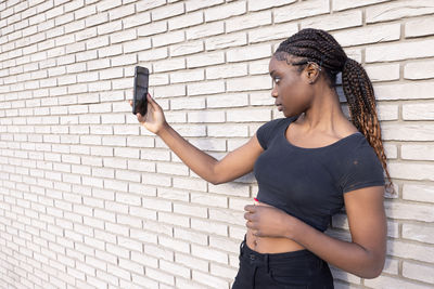 Young man using mobile phone