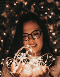 Portrait of young woman wearing sunglasses