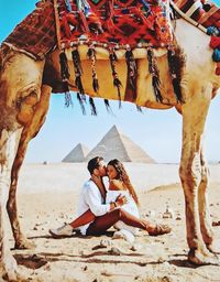 Couple sitting on beach