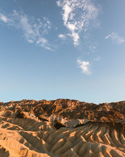 Scenic view of rock formations against sky