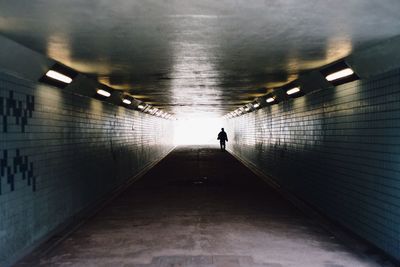 People walking in tunnel