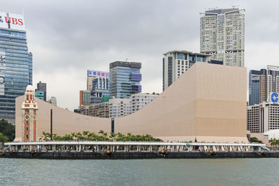 Clock tower at tsim sha tsui by sea in city