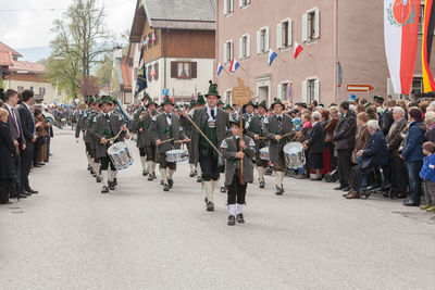 Panoramic view of people in town square