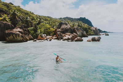 Aerial view of man rowing on sea