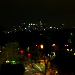 View of illuminated city at night