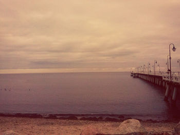 Scenic view of sea against sky at sunset