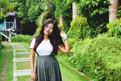 Young woman standing at park