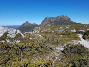 Scenic view of rocky mountains against clear sky