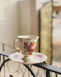 Close-up of coffee cup on table