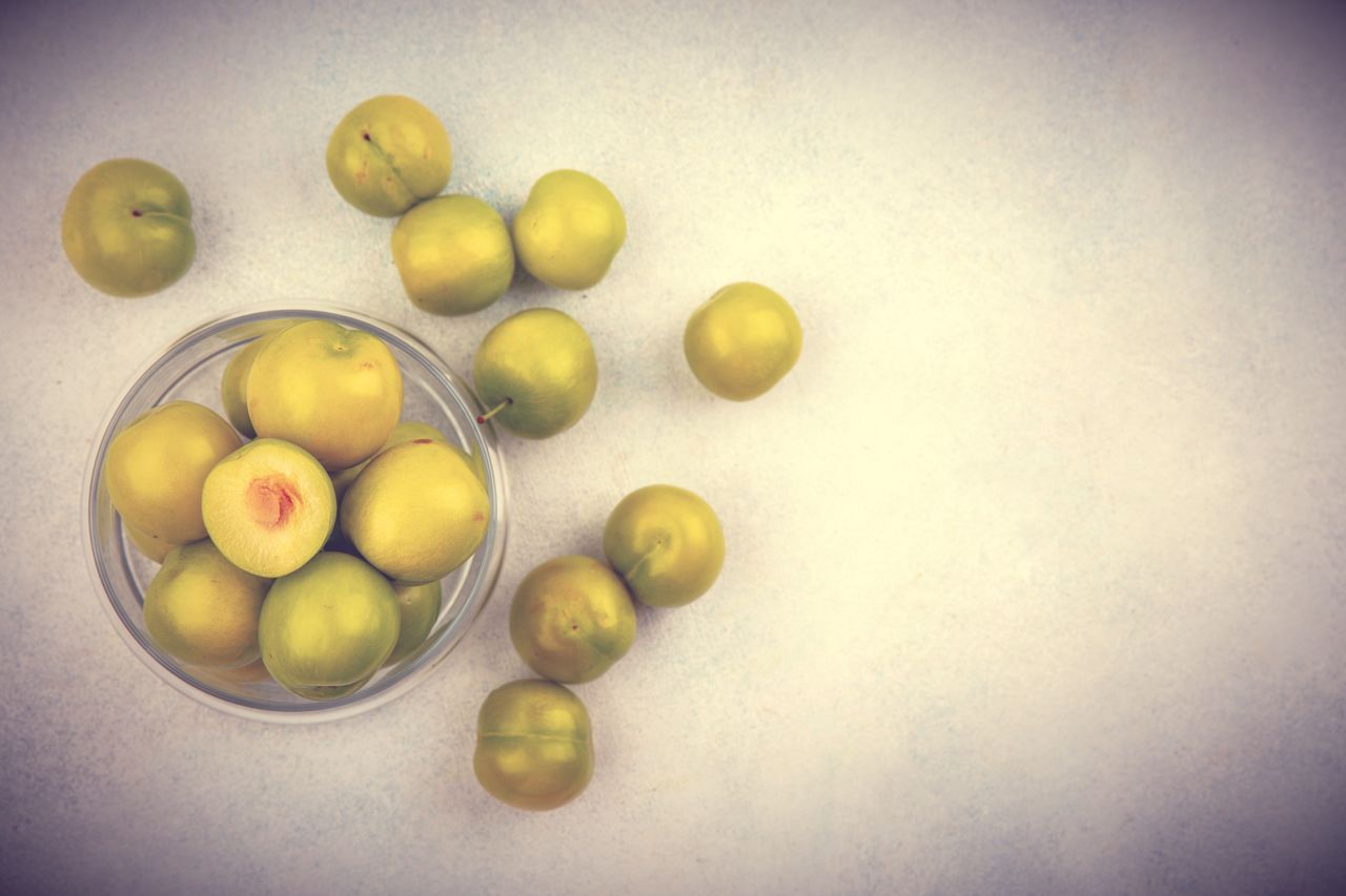 yellow, food, healthy eating, food and drink, fruit, macro photography, wellbeing, green, freshness, indoors, no people, plant, produce, still life, vignette, painting, large group of objects, still life photography, flower, citrus fruit, directly above, close-up, studio shot, olive, citrus, high angle view