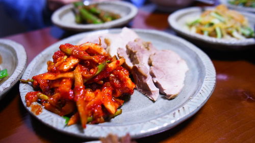 Close-up of meat served in plate on table