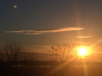 Scenic view of landscape at sunset