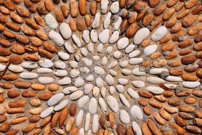 Full frame shot of pebbles at beach