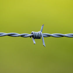 Close-up of rope against blue background