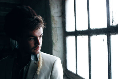 Portrait of young man looking away