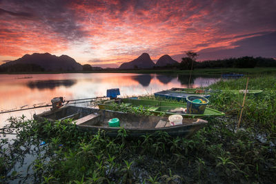 Scenic view of lake against sky during sunset